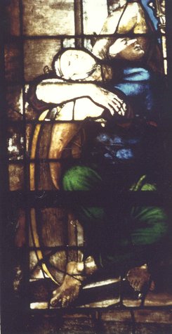 Bishop Cyril baptizes Simplicio in the prison